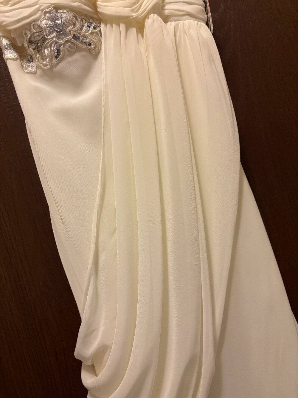 Beautiful ivory long formal dress. I bought for my wedding that I never had.